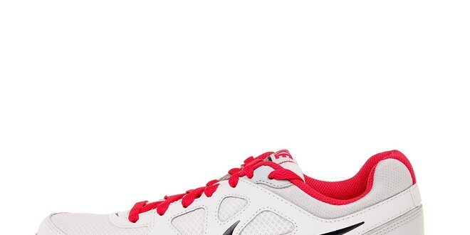 Dámske biele bežecké topánky Nike Revolution s ružovými detailmi