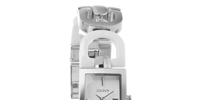 Dámske strieborné oceľové hodinky DKNY s bielymi keramickými detailami