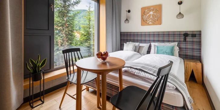 Apartmány priamo pri vrchu Szczyrk: neobmedzený vstup do wellness, víno aj raňajky