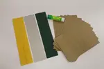 Papierové vrecká, lepidlo a kreatívny papier (žltý, strieborný, tmavozelený)