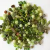 250 g Sklenený mix korálok + navliekacia gumička (zelený)