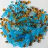 250 g Sklenený mix korálok + navliekacia gumička (modrý, rybky)