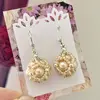 Dámske šité náušnice so striebrom Santia Handmade "Gulička" | Svetlozlatá