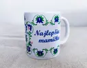 330 ml Biely hrnček s folklórnym motívom "Najlepšia mamička/modrá"